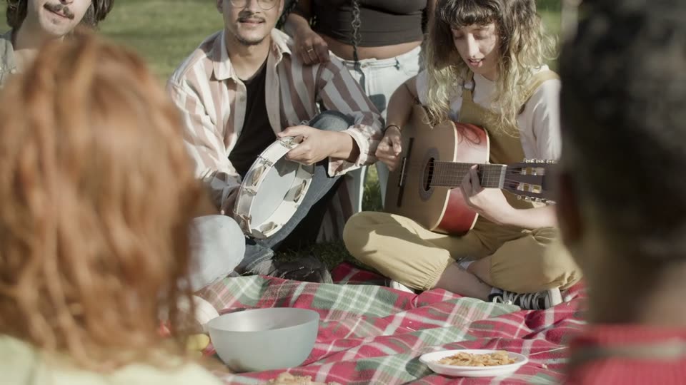 People enjoying music together outdoors